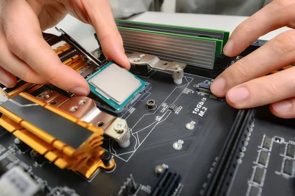 depositphotos_74620805-stock-photo-assembling-computer-parts-closeup